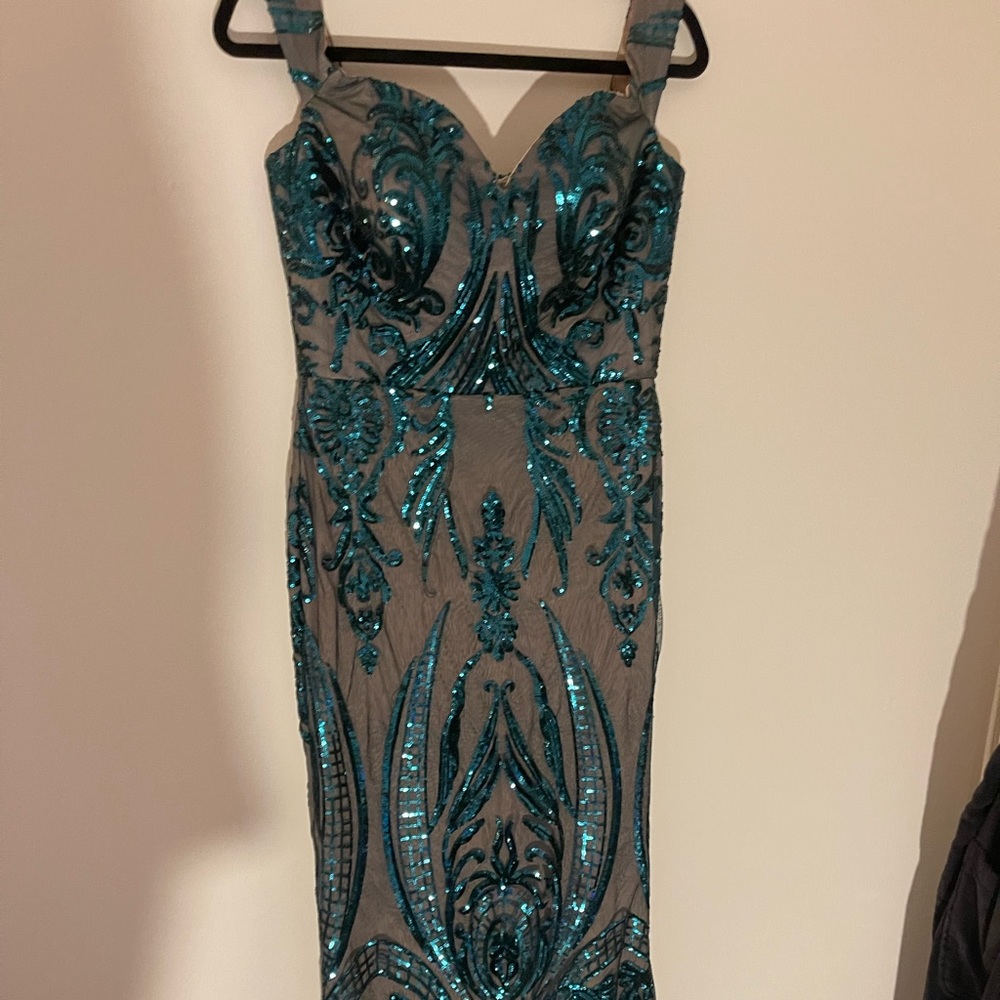 Diane and Company based out of New Jersey sequined off the shoulder dress